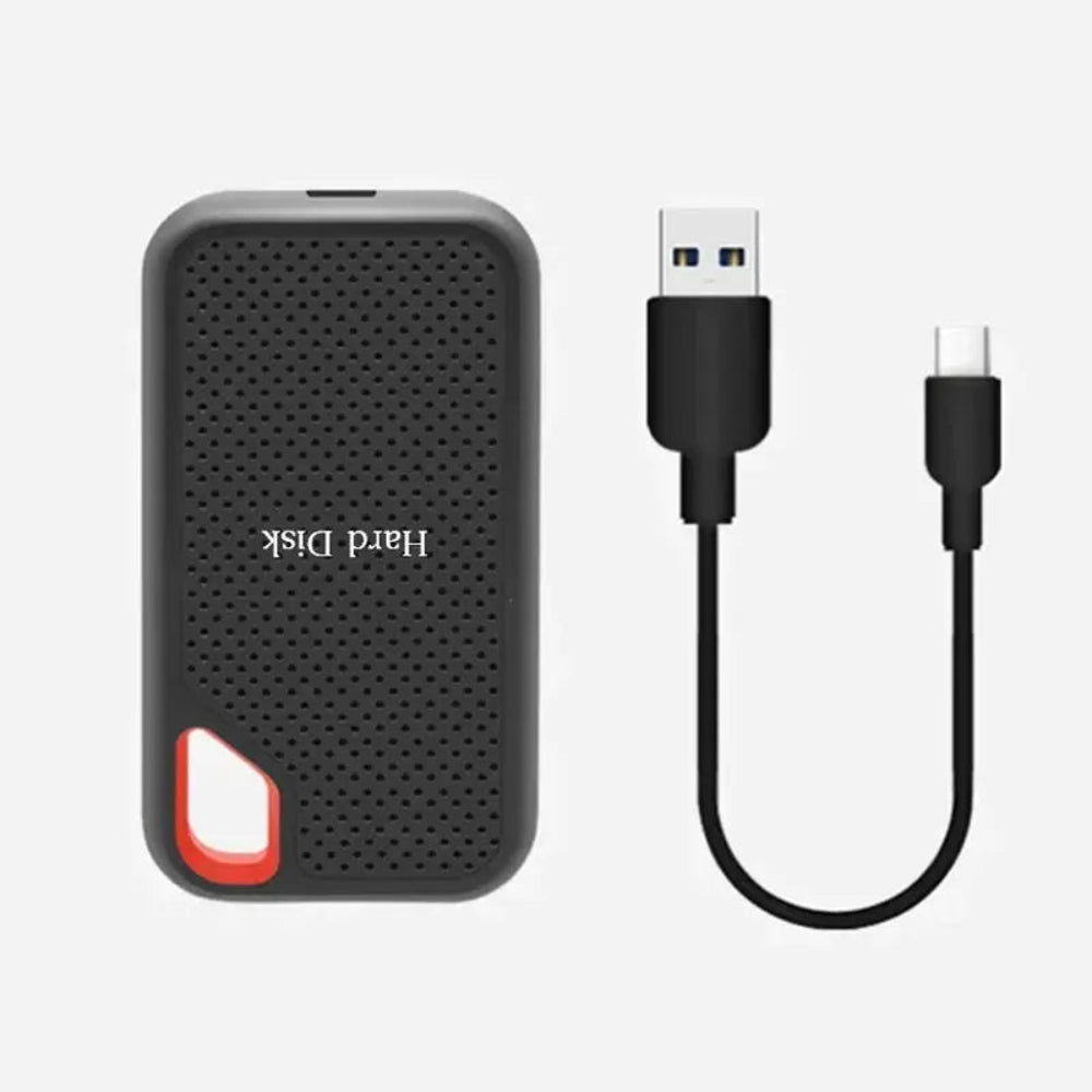 SSD portable posé sur une table, mettant en avant sa légèreté