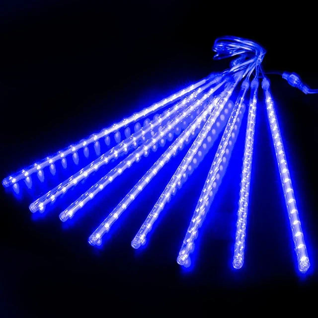 Lumières LED de pluie de météores éclairant un mariage en plein air