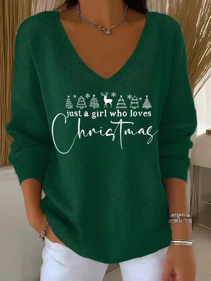 Gros plan sur le tricot doux du pull de Noël