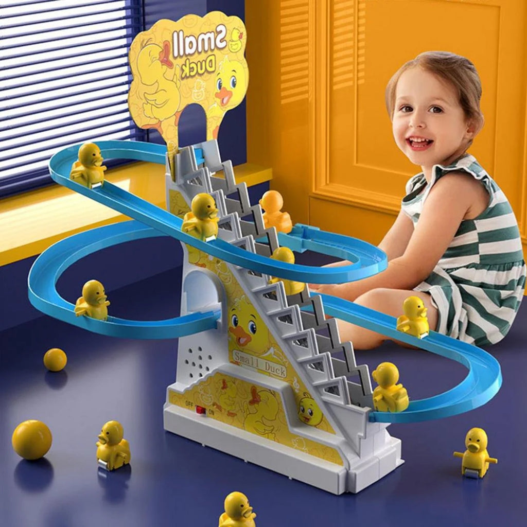 Ensemble de jeu coloré avec canards glissant sur une piste