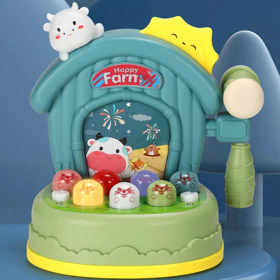 Jeu tape-taupe musical pour enfants avec marteau et taupes colorées