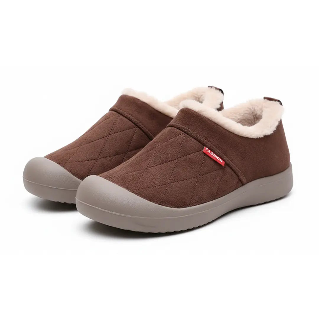 Vue de dessus des chaussons marron pour femmes