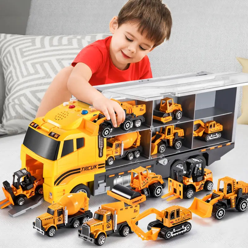 Vue rapprochée de camions miniatures et d'une excavatrice