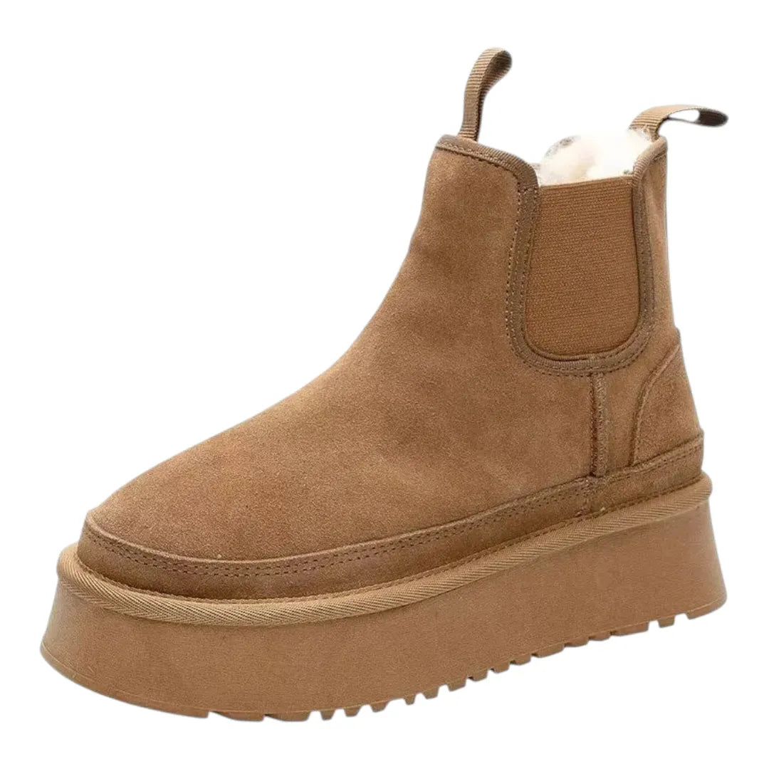 Bottines noires sur fond blanc, design minimaliste