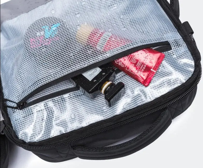 Poche latérale du sac à dos pour accès rapide aux objets