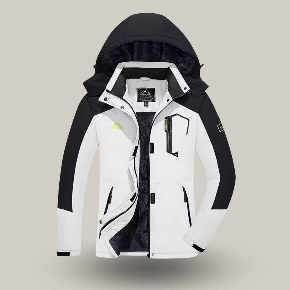 Gros plan sur les poches zippées d'une veste de ski technique