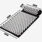 Tapis d'acupression avec coussin ergonomique sur fond blanc