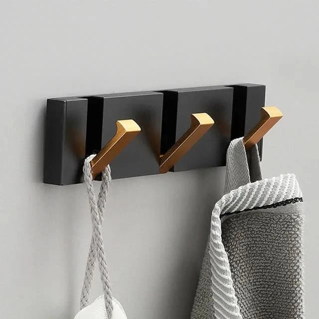Crochet mural noir-doré, parfait pour un intérieur moderne