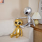 Détail des coutures du sac à dos peluche alien, tissu doux