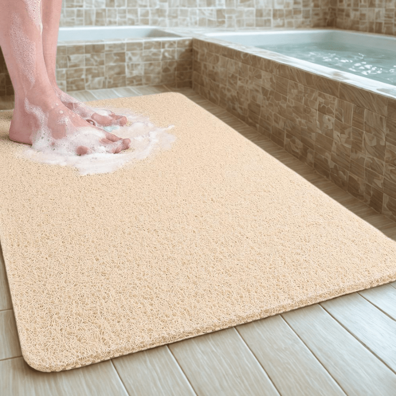 Tapis de douche gris avec surface antidérapante texturée