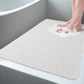 Tapis de douche avec écoulement rapide de l'eau