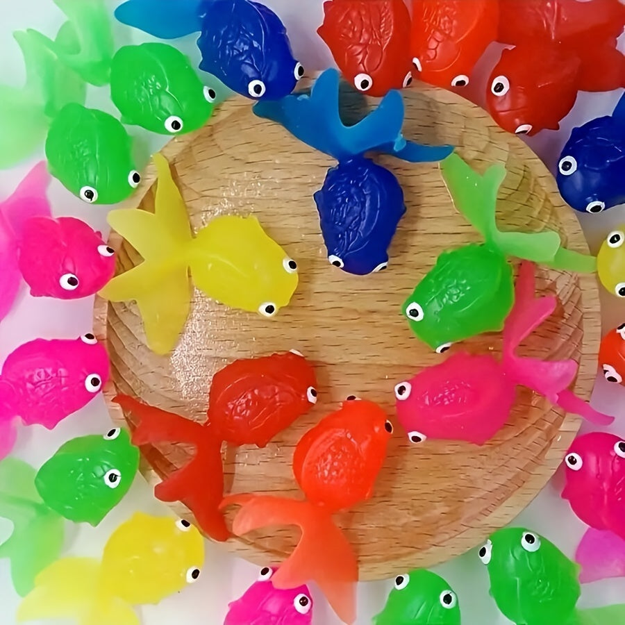 Poissons en plastique multicolores flottant dans une baignoire