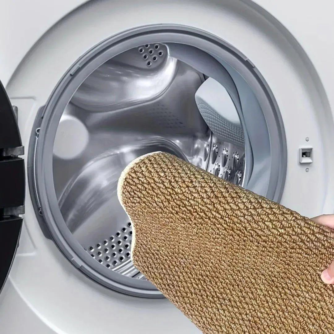 Tapis absorbant en utilisation devant une porte