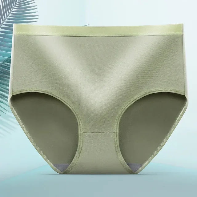 Sous-vêtement féminin vert, protection anti-fuites visible