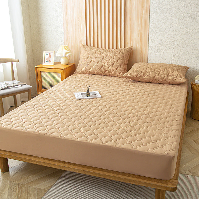 Protection de matelas imperméable en situation sur un lit