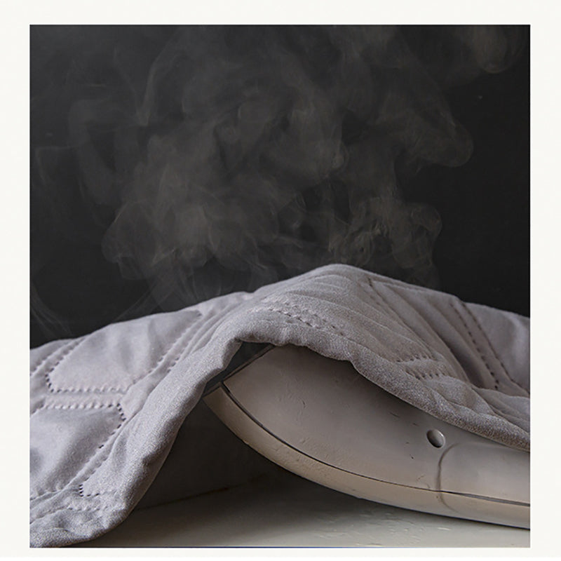 Protection de matelas hypoallergénique posée sur un lit