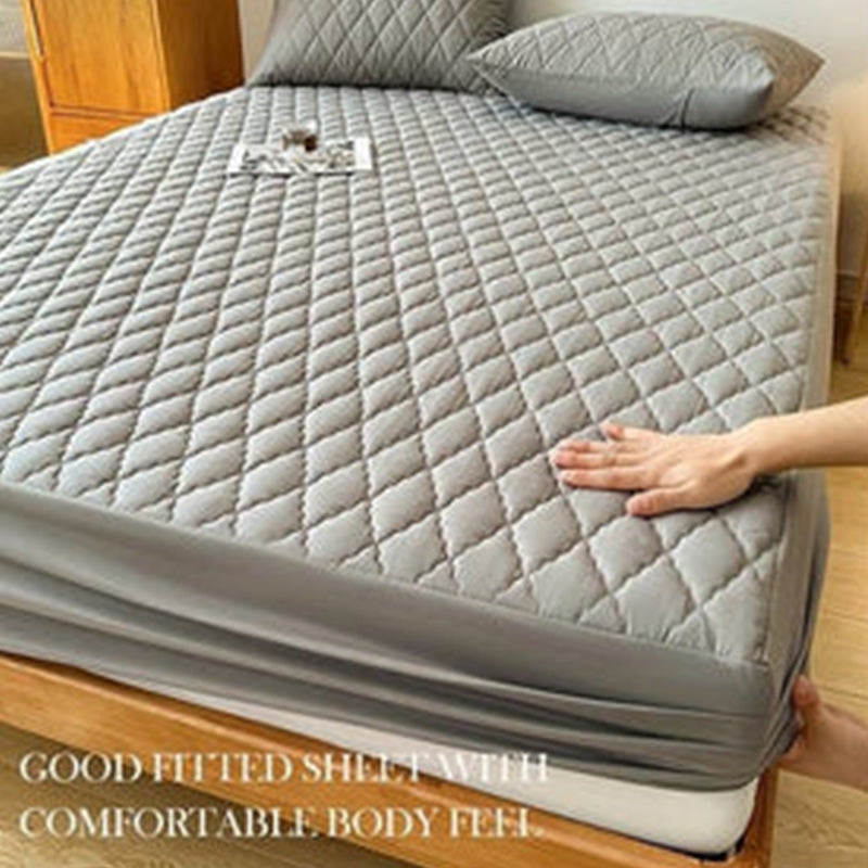 Vue latérale de la protection de matelas sur un lit