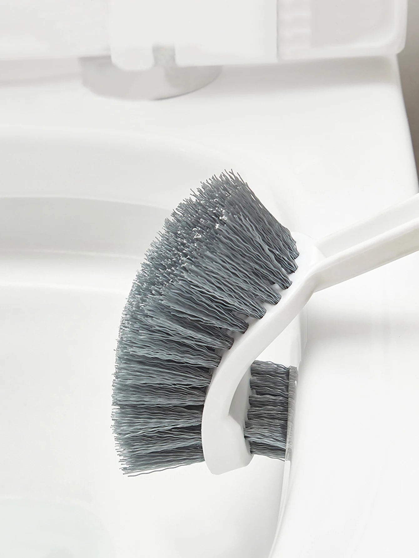 Vue latérale montrant la double face de la brosse