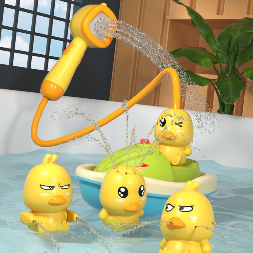 Pommeau de douche à piles avec canards gicleurs dans le bain