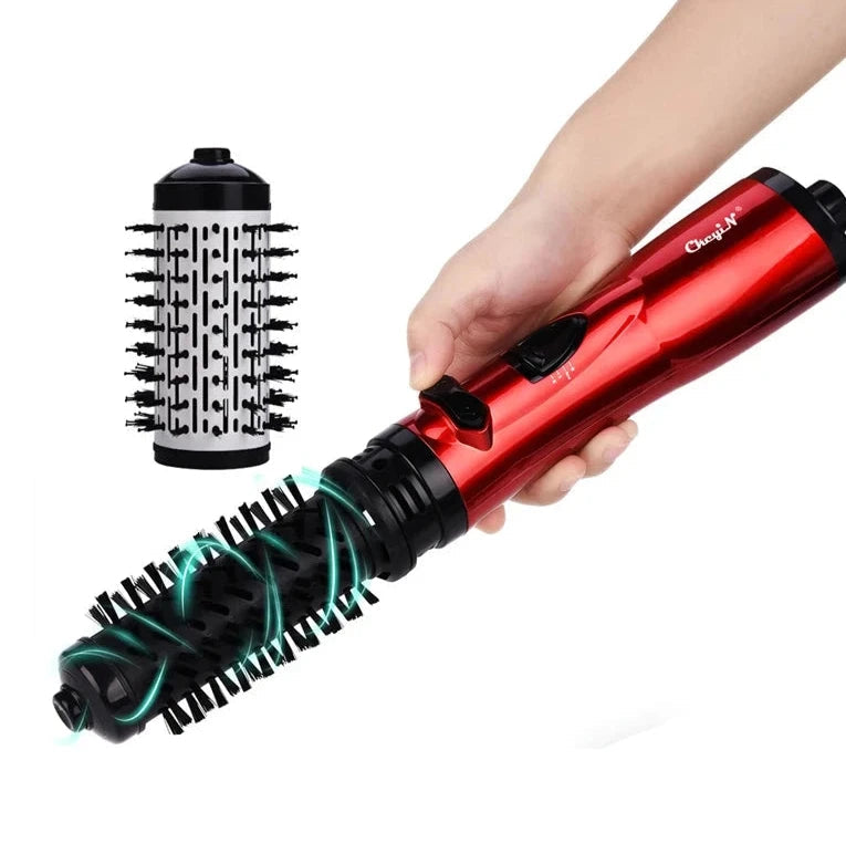 Brosse ionique auto-rotative sur fond blanc, vue de profil