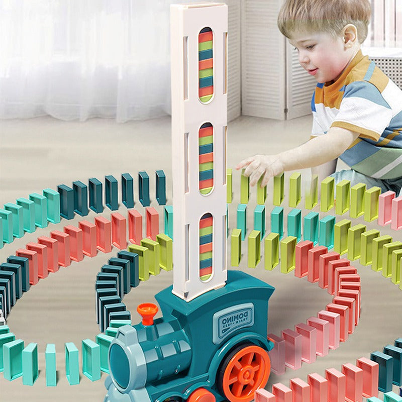 Train domino automatique coloré plaçant des dominos en ligne