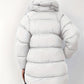 Veste en duvet pour femme montrée de dos, coupe décontractée