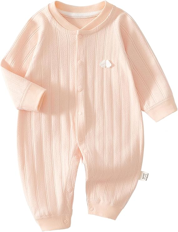 Vue latérale de la combinaison bébé en coton