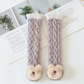 Chaussettes bébé kaki, vue d'ensemble avec fond neutre