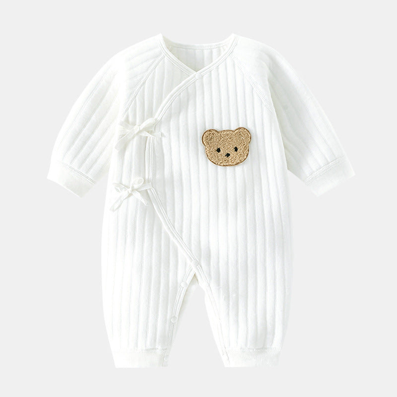 Vue de dos de la salopette bébé avec boutons-pression pratiques