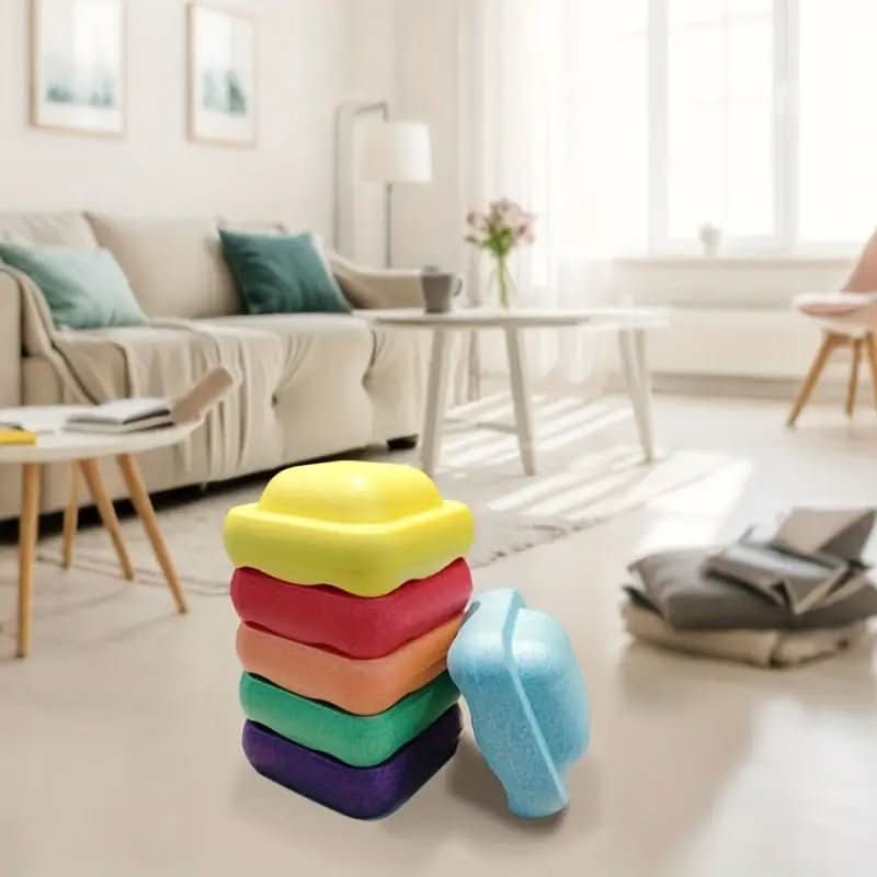 Blocs d'équilibre disposés en cercle sur l'herbe