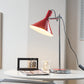 Vue latérale de la lampe montrant le cordon et la prise