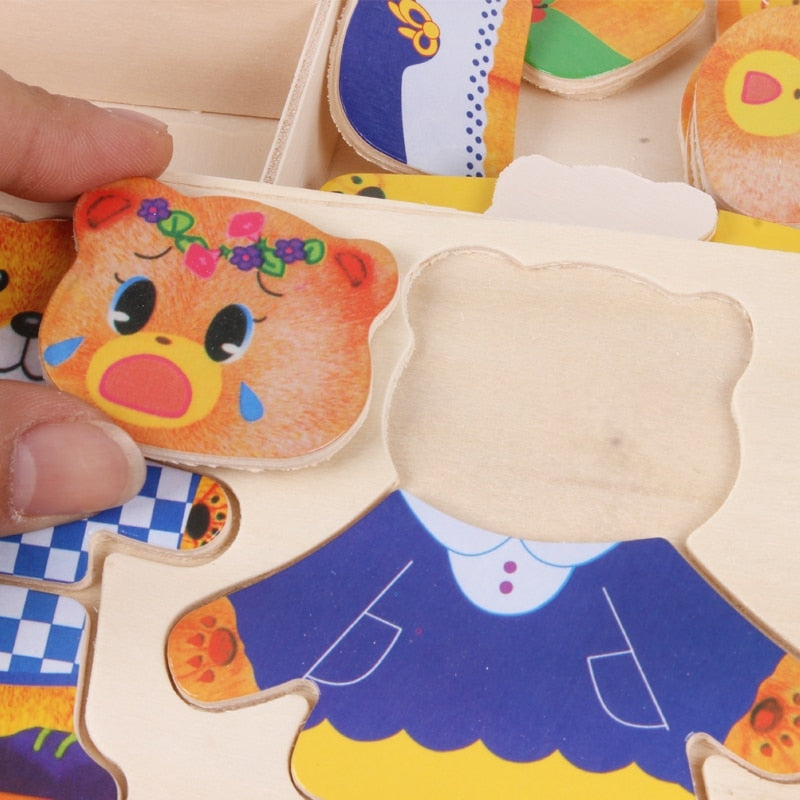 Enfant jouant avec un puzzle d'habillage en bois