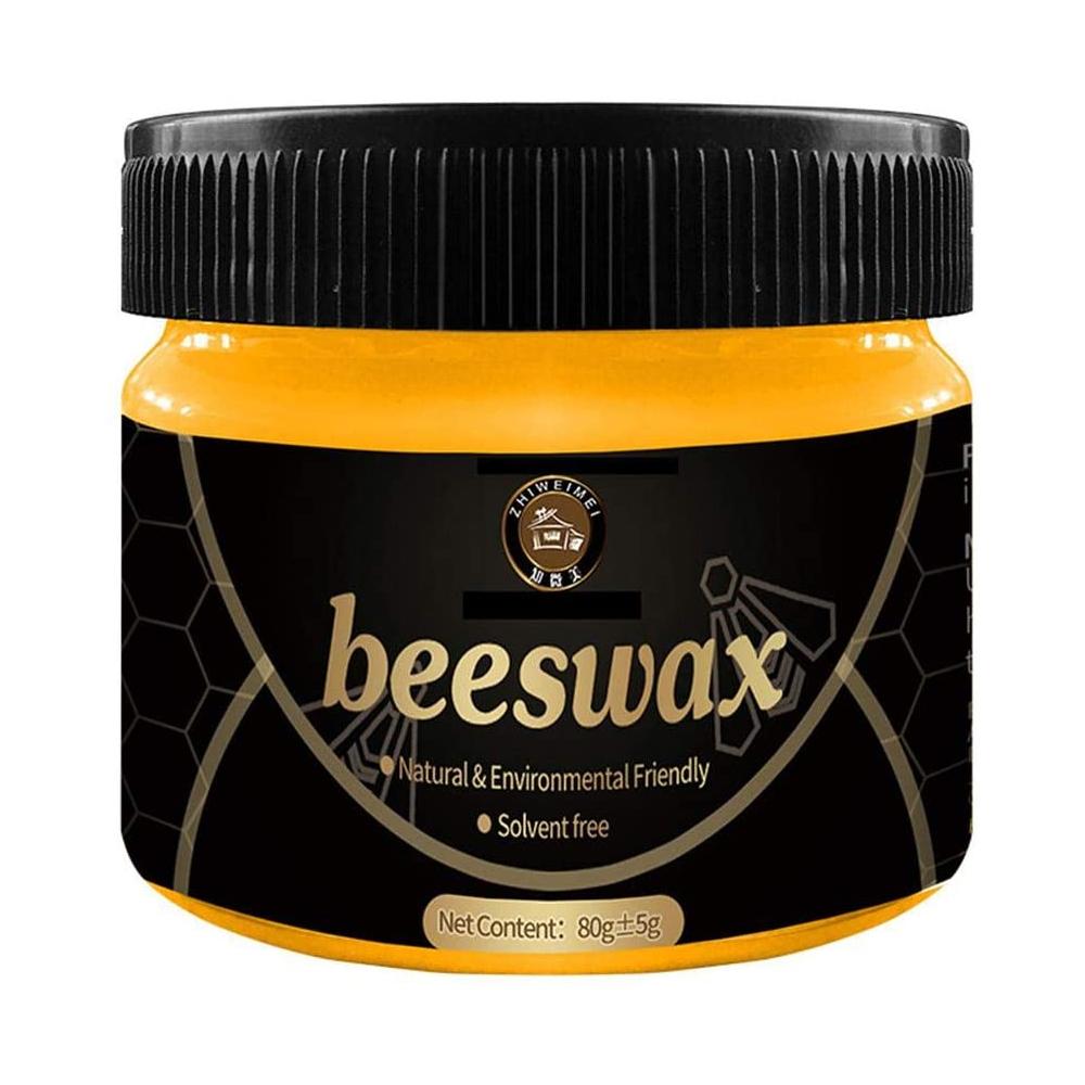 Cire d'abeille posée à côté d'une brosse de polissage