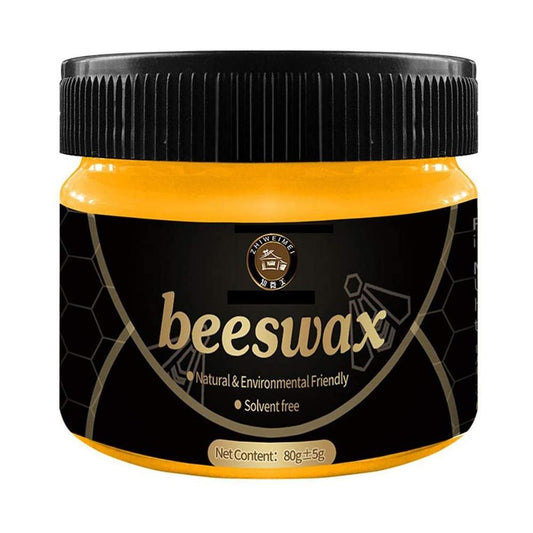 Cire d'abeille posée à côté d'une brosse de polissage