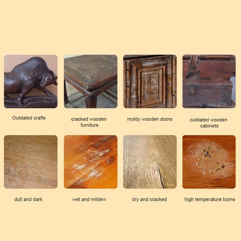 Main appliquant la cire sur un meuble en bois