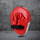 Cible de boxe légère en PU noir et rouge