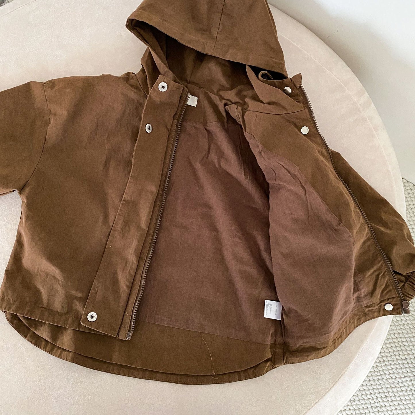 Détail du mélange de coton durable de la parka pour enfants
