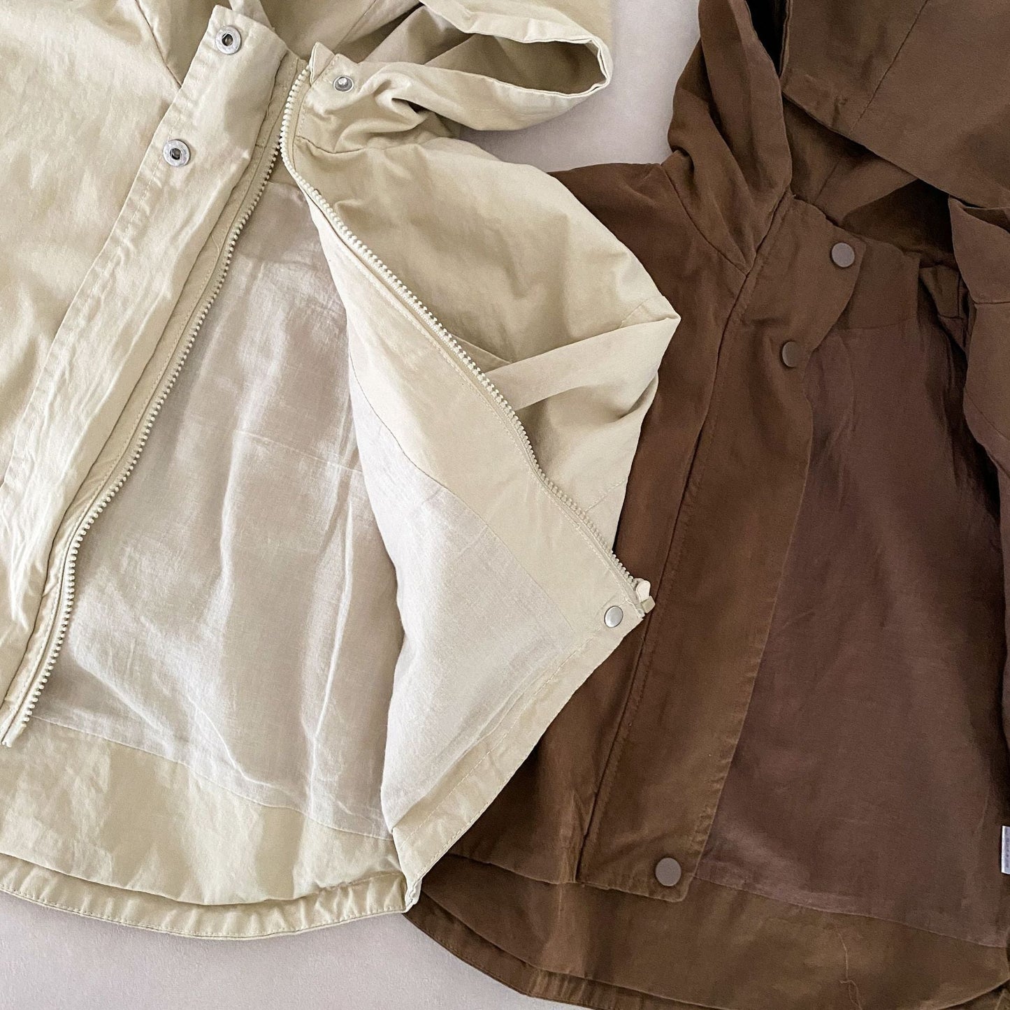 Veste parka unisexe marron avec capuche et poches pratiques