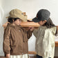 Veste parka beige pour enfants, vue de côté