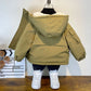 Veste d'hiver garçon avec capuche, vue de face