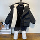Fermeture éclair robuste sur veste d'hiver enfant