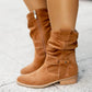 Vue arrière des bottines marron, mettant en valeur la couture
