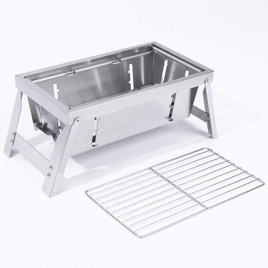 Barbecue plié, prêt à être transporté pour le camping