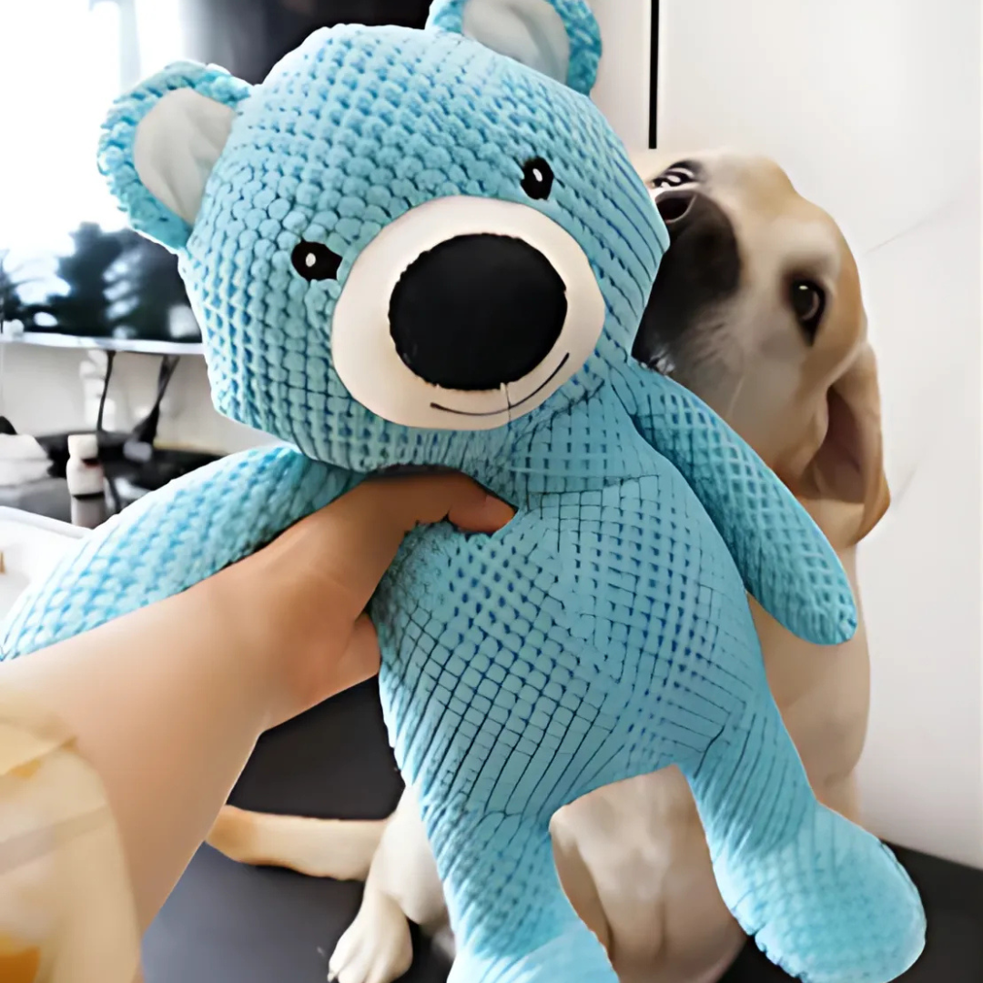 Détail du tissu synthétique résistant du jouet pour chien