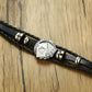 Bracelet en cuir noir avec design de cartes de poker