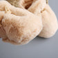 Chaussons bébé montrant le design élastique pour un bon ajustement