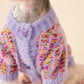 Vue de côté du pull en fleece sur un chien