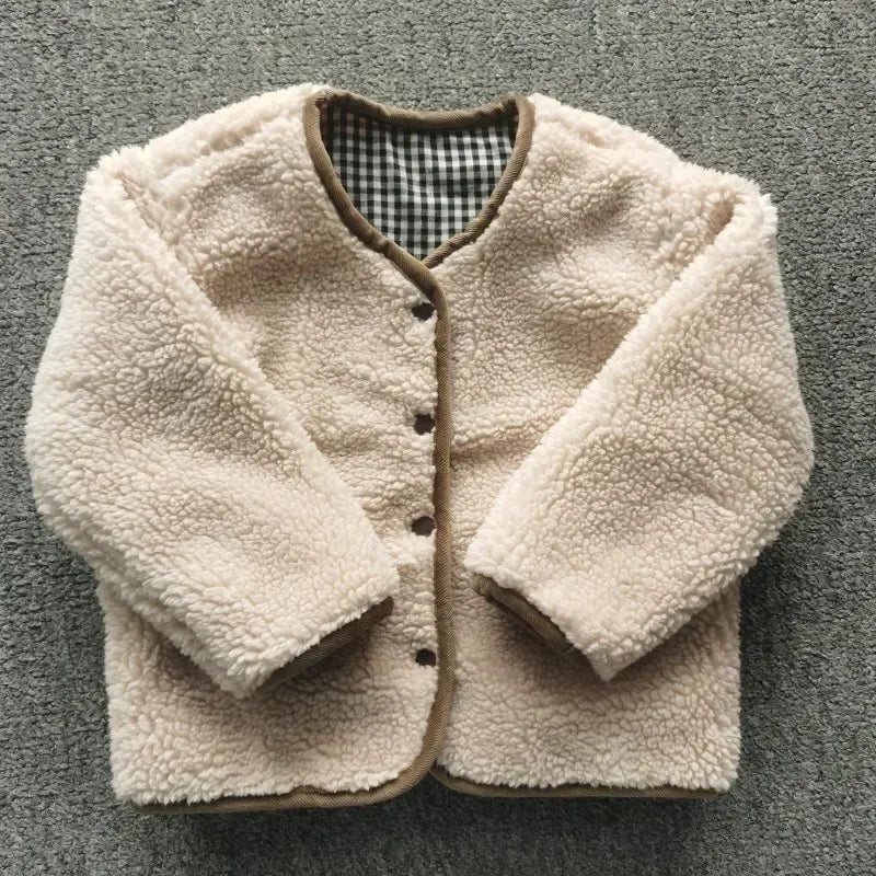 Veste réversible enfant, intérieur peluche visible