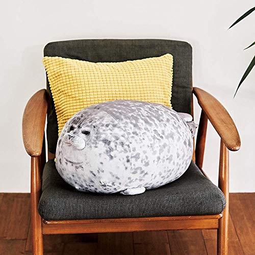 Coussin peluche phoque rond sur fond blanc