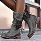 Bottes mi-mollet marron sur fond blanc, vue latérale